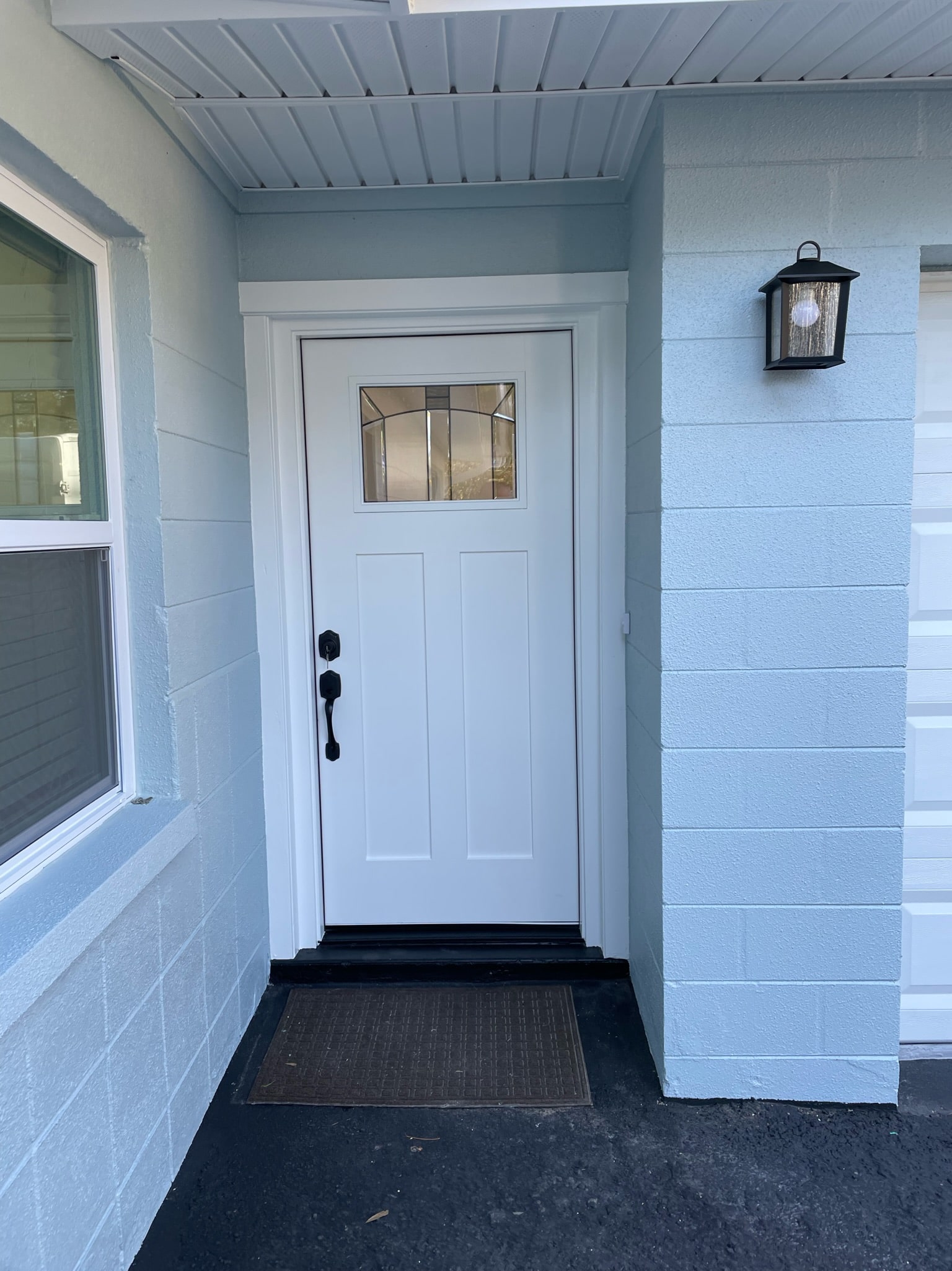 Re-painted door with light blue exterior